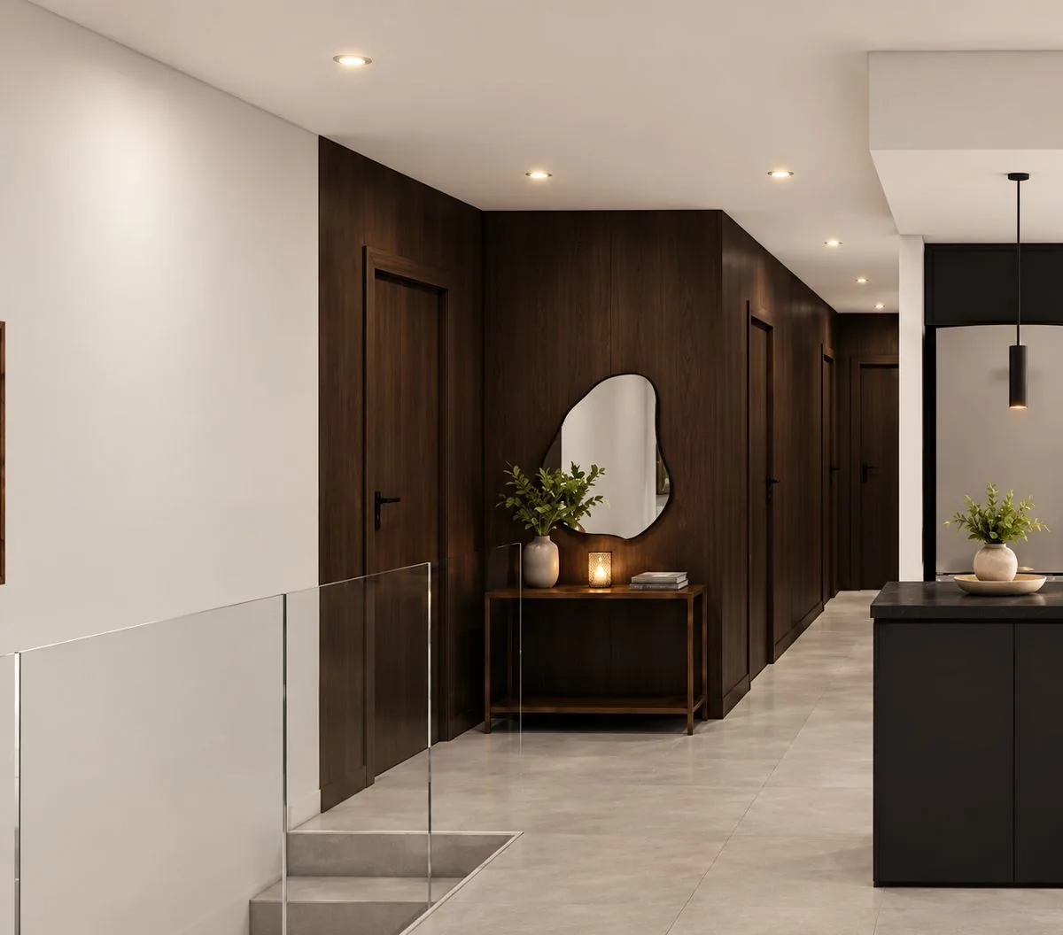 Hall de una unidad con revestimiento de madera oscura, espejo orgánico y baranda de vidrio